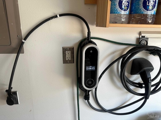 1988 Heritage Park Way, Navarre, FL 32566 - garage view of car charger