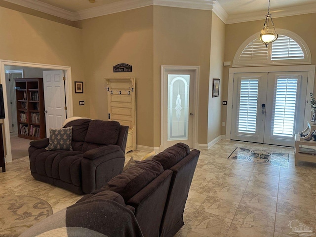 1988 Heritage Park Way, Navarre, FL 32566 - living room with french doors, ornamental molding, a high ceiling, and baseboards