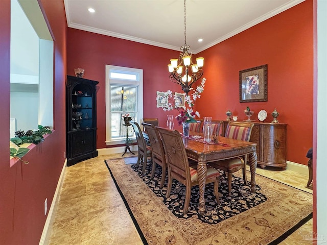 dining area with ornamental molding, a chandelier, and baseboards