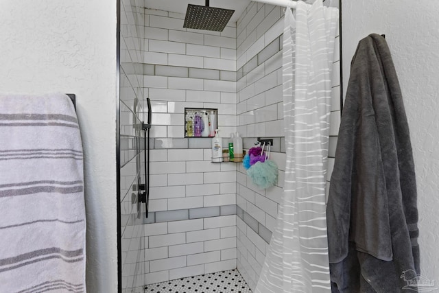 bathroom with a shower with curtain