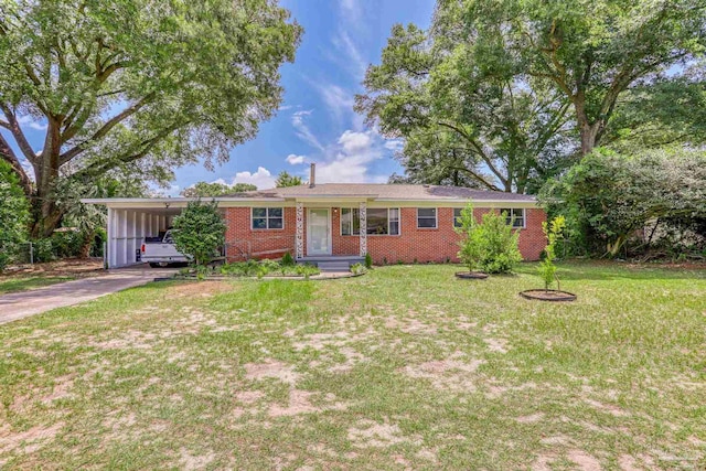 single story home featuring a front lawn and a carport