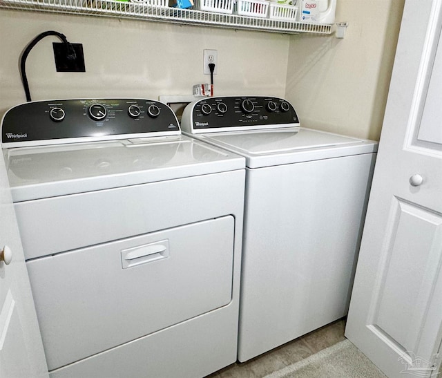 laundry area featuring separate washer and dryer