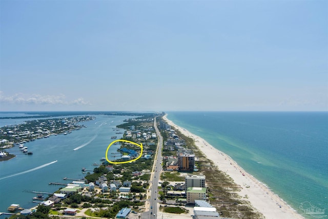 aerial view with a view of the beach and a water view