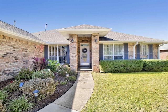 ranch-style house with a front yard