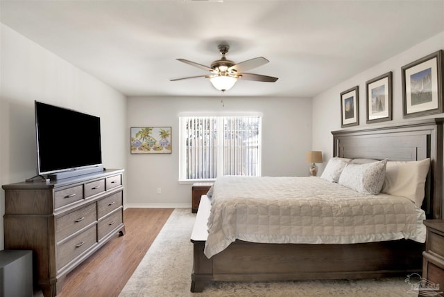 bedroom featuring ceiling fan and light wood-type flooring