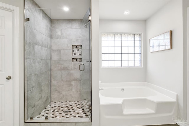 bathroom with independent shower and bath