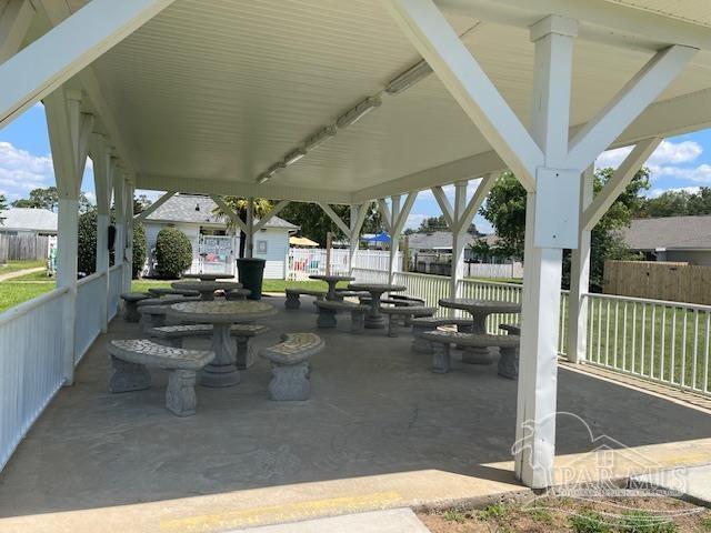 view of patio / terrace featuring fence