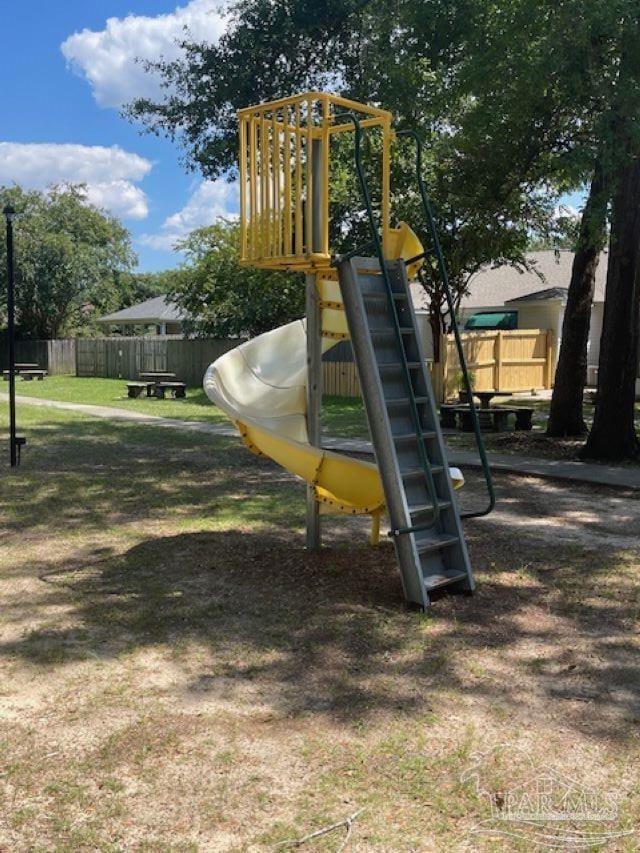 community jungle gym with fence