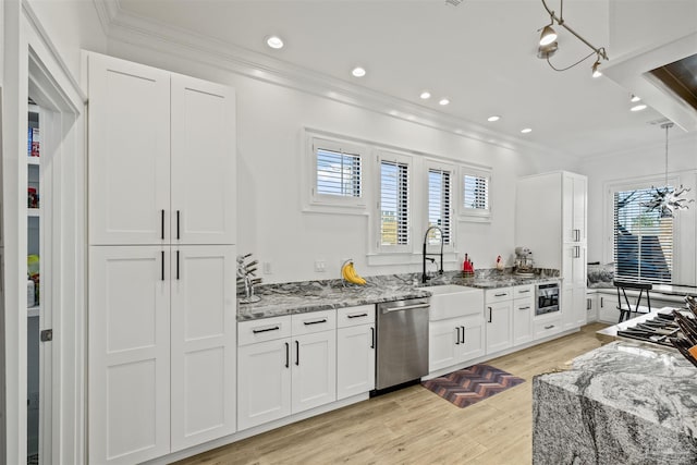 kitchen featuring pendant lighting, dishwasher, white cabinets, light stone counters, and light hardwood / wood-style floors