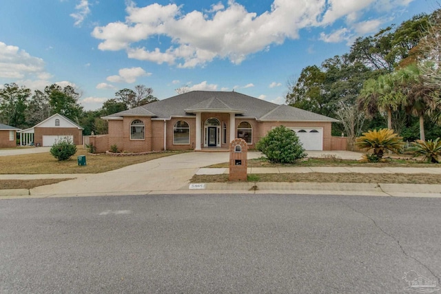 single story home with a garage