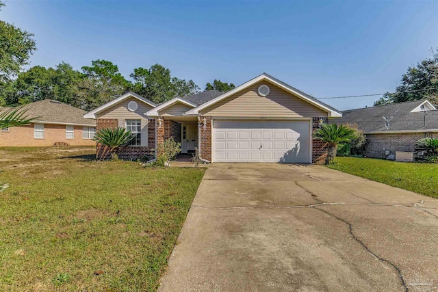 ranch-style home featuring a garage and a front yard