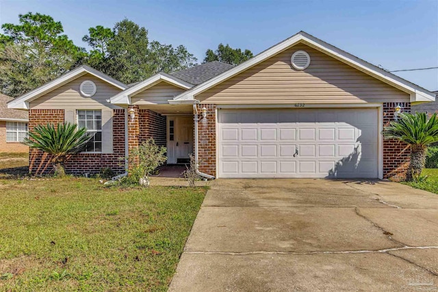 ranch-style house featuring a front lawn and a garage