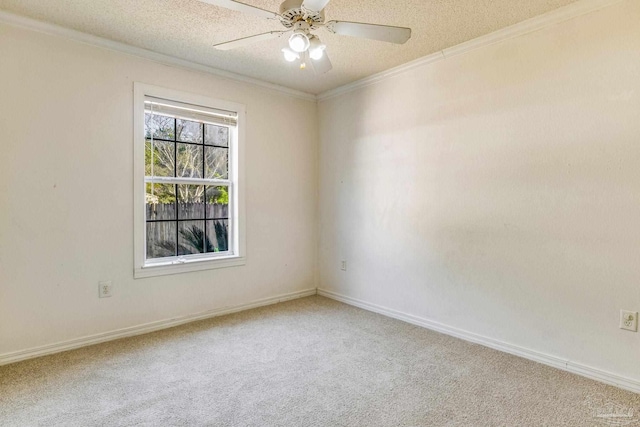 unfurnished room with ceiling fan, carpet, and a textured ceiling