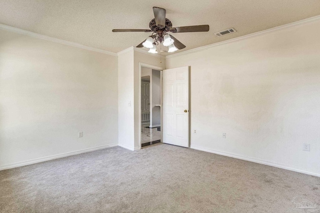 empty room with carpet and ornamental molding