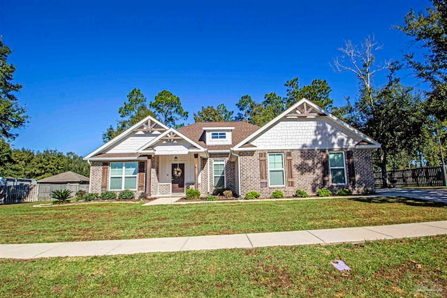 craftsman house featuring a front yard