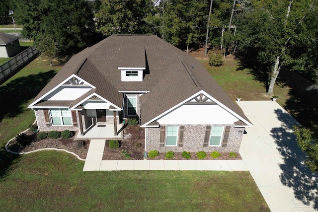 view of front of home with a front lawn