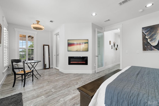 bedroom featuring light hardwood / wood-style floors