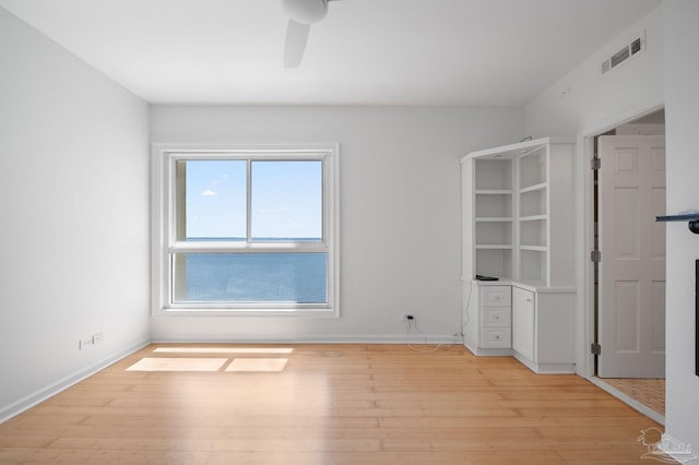 825 Bayshore Dr Unit 1206, Pensacola, FL 32507 - unfurnished bedroom featuring light wood-type flooring, baseboards, and ceiling fan