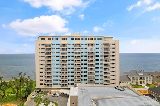 825 Bayshore Dr Unit 1206, Pensacola, FL 32507 - view of apartment building / complex with a water view and uncovered parking