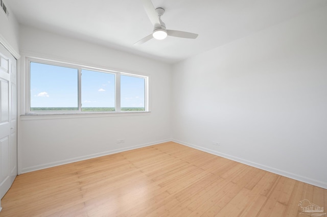 825 Bayshore Dr Unit 1206, Pensacola, FL 32507 - spare room with light wood-type flooring, baseboards, and a ceiling fan