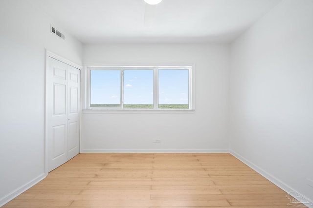 825 Bayshore Dr Unit 1206, Pensacola, FL 32507 - spare room with light wood-type flooring and baseboards