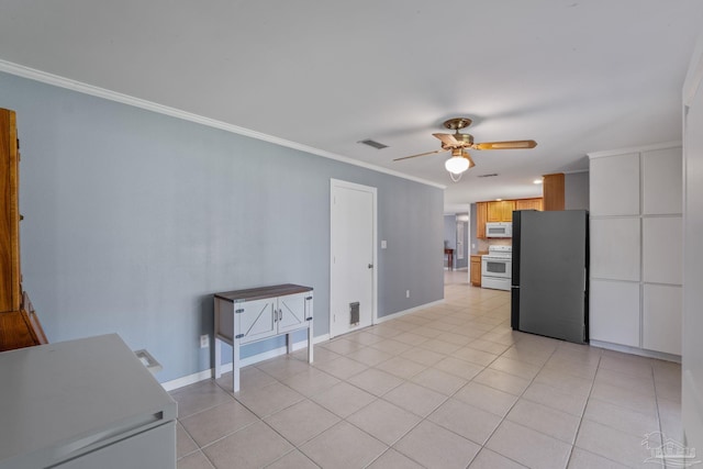 kitchen with white appliances, light tile patterned flooring, visible vents, and ornamental molding