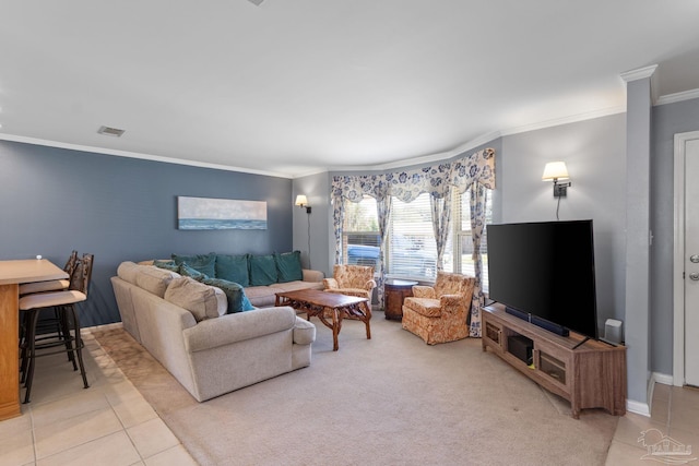 living room featuring visible vents, ornamental molding, and light tile patterned flooring