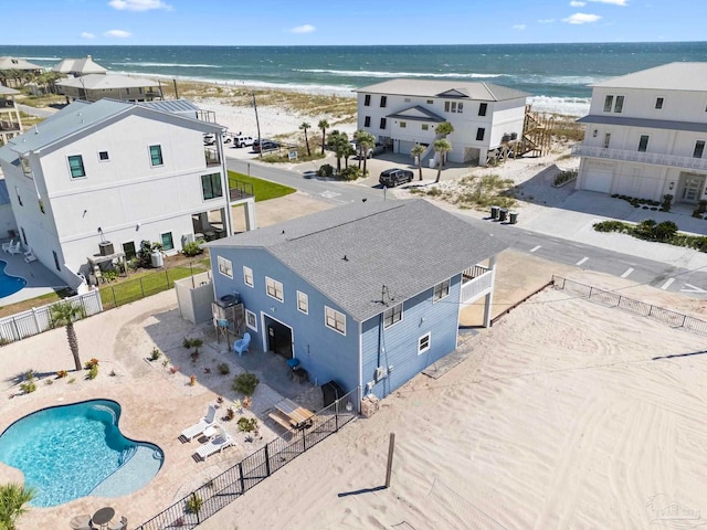 aerial view with a view of the beach and a water view