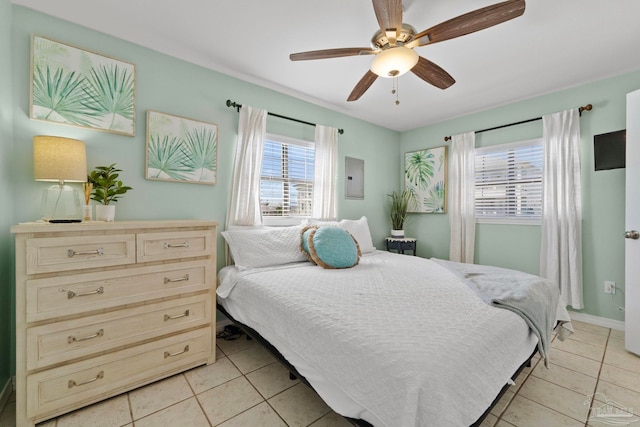 bedroom featuring ceiling fan and light tile patterned floors