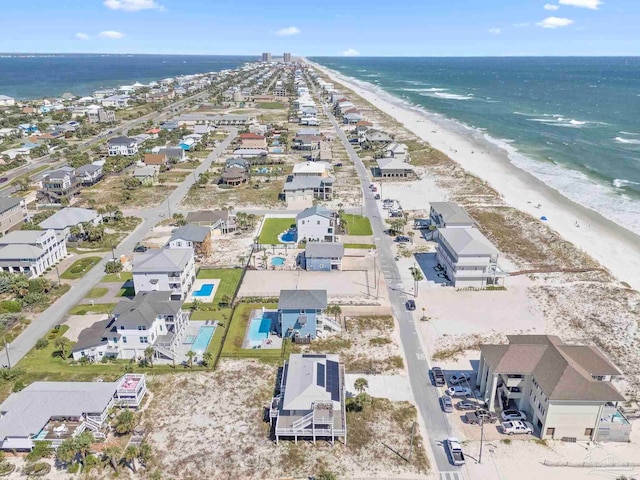 aerial view with a view of the beach and a water view