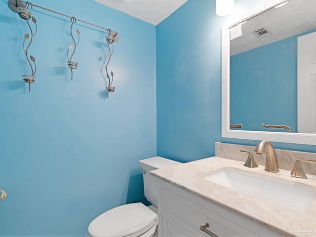 2701 E De Soto St, Pensacola, FL 32503 - bathroom featuring toilet and vanity
