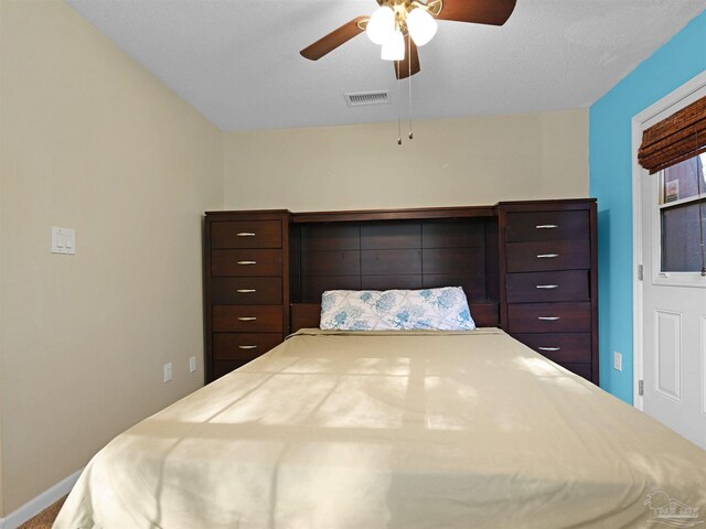 2701 E De Soto St, Pensacola, FL 32503 - bedroom featuring a ceiling fan and baseboards