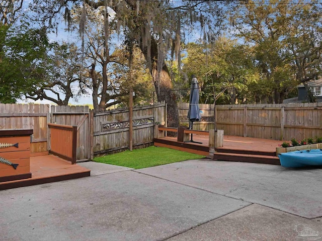 2701 E De Soto St, Pensacola, FL 32503 - view of patio / terrace with a fenced backyard and a deck