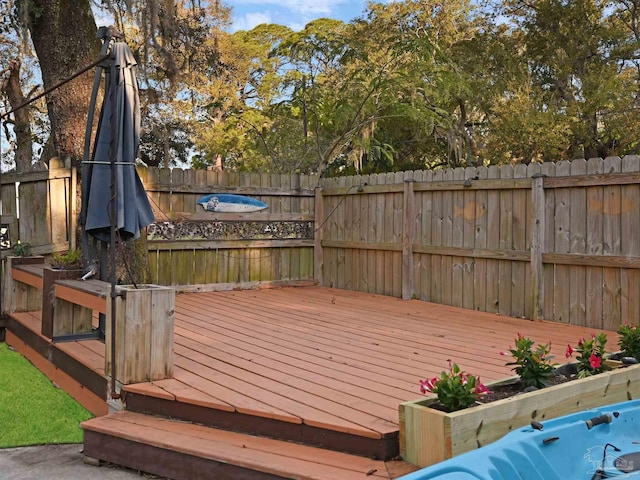 2701 E De Soto St, Pensacola, FL 32503 - wooden terrace featuring a fenced backyard