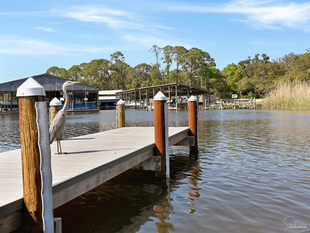 2701 E De Soto St, Pensacola, FL 32503 - dock featuring boat lift and a water view