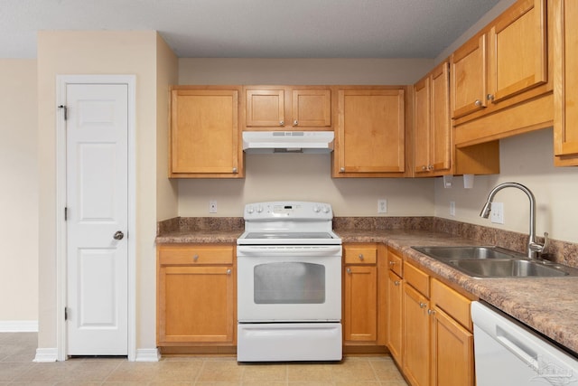 kitchen featuring sink and white appliances