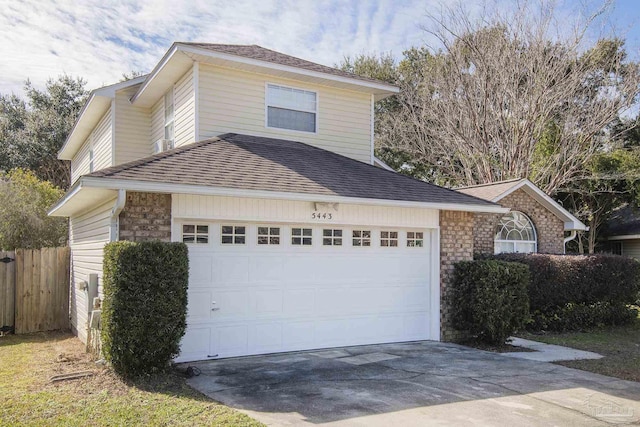 view of home's exterior with a garage