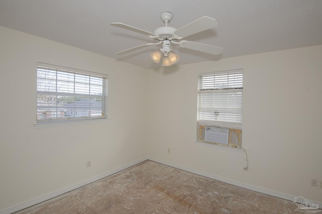 unfurnished room featuring cooling unit and ceiling fan