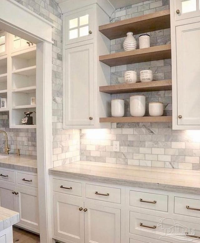 pantry with a sink