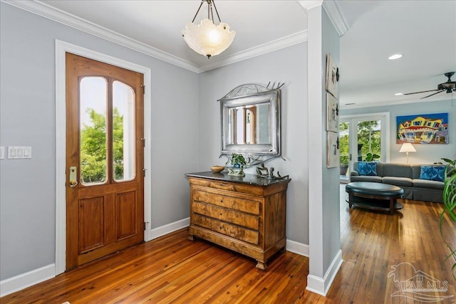 foyer featuring a ceiling fan, baseboards, ornamental molding, recessed lighting, and hardwood / wood-style floors