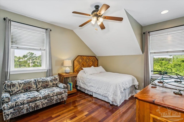 bedroom with ceiling fan, vaulted ceiling, recessed lighting, and wood finished floors