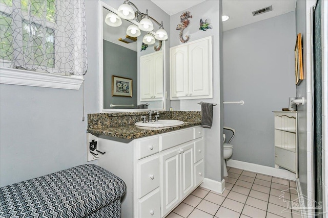 full bathroom with visible vents, tile patterned floors, toilet, and vanity