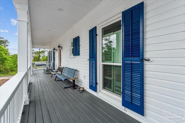 deck featuring covered porch