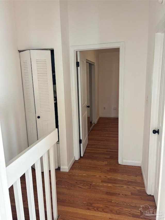 hallway featuring dark hardwood / wood-style floors