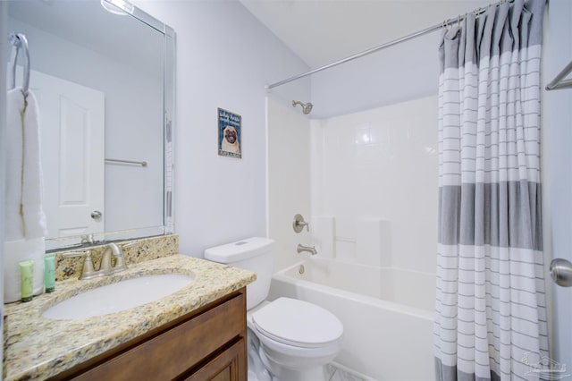 full bathroom featuring shower / bath combo, toilet, and vanity