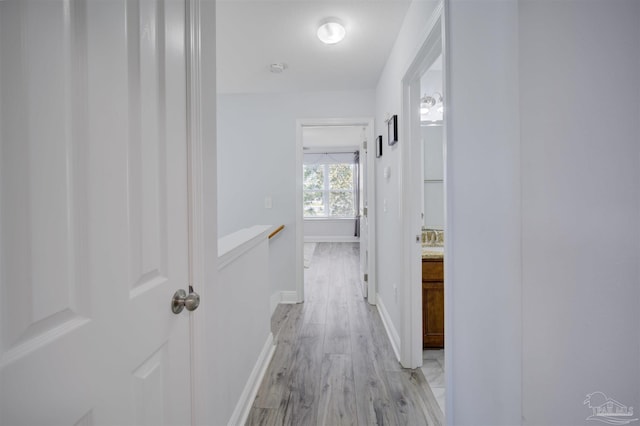 hallway featuring light wood-type flooring