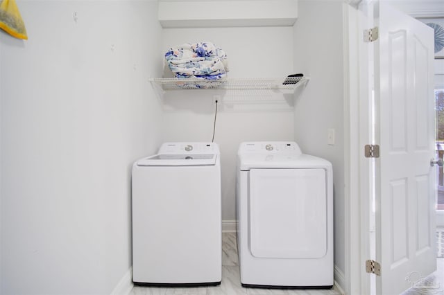 laundry area featuring washer and clothes dryer