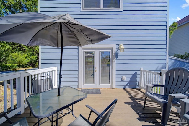 wooden deck with french doors