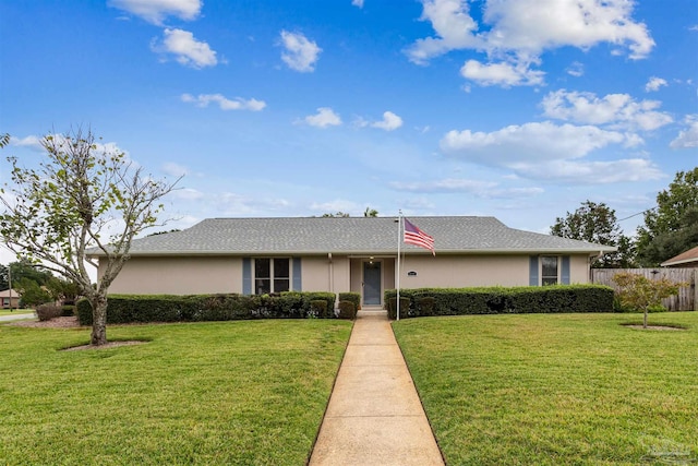 ranch-style house featuring a front yard