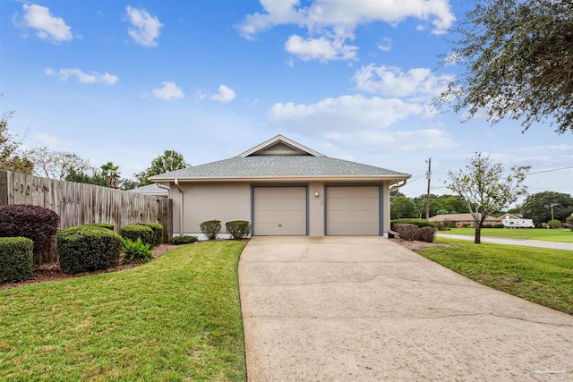 exterior space with a lawn and a garage